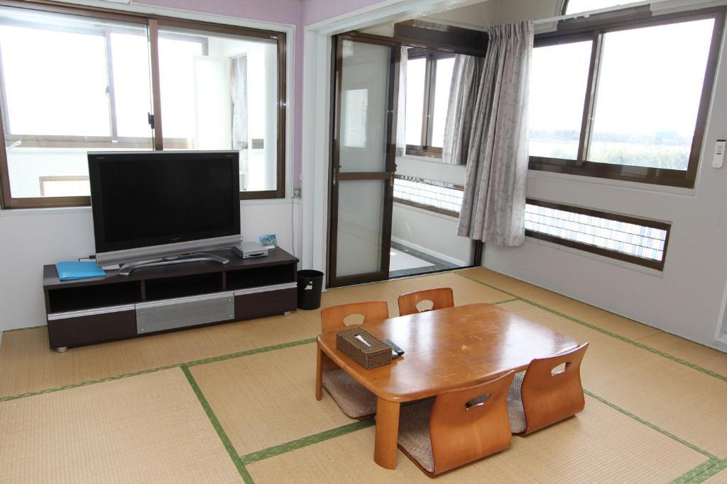 오키나와 시 비치사이드 콘도미니엄 아파트 객실 사진